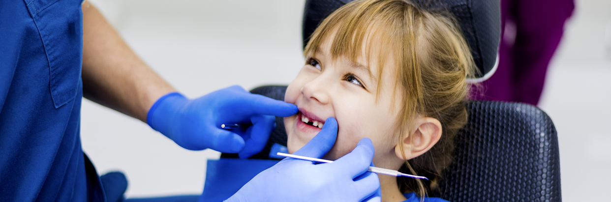 11476-7-Girl at dentist-1242x411.jpg