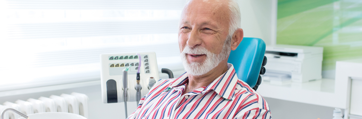 man-in-dental-chair-1242x411.jpg