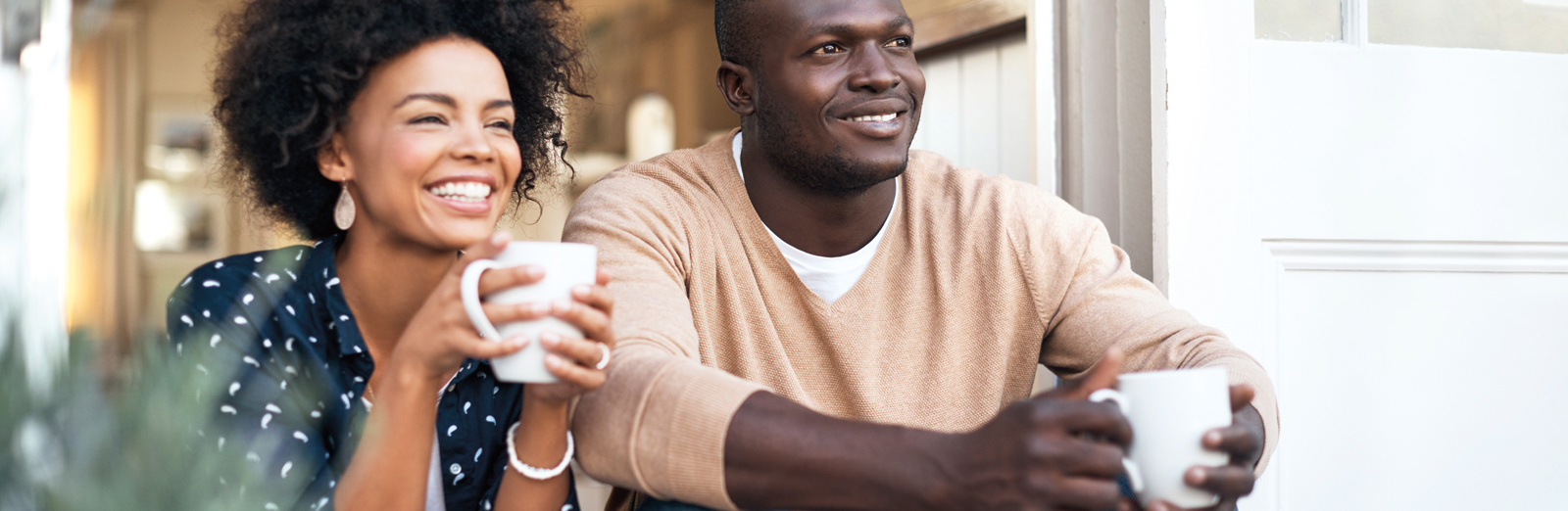 couple-drinking-coffee-1600x522.jpg