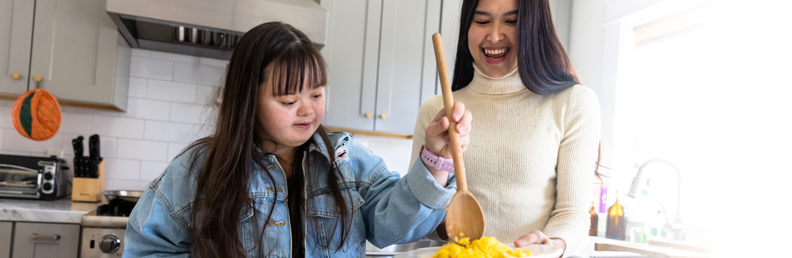 mom-and-daughter-cooking-1600x522.jpg