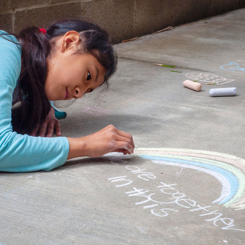 girl-drawing-on-sidewalk-800x800.jpg