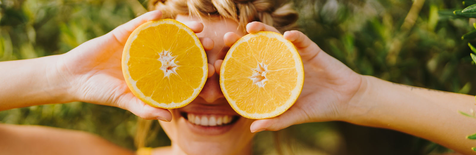 woman-orange-slices-1600x522.jpg