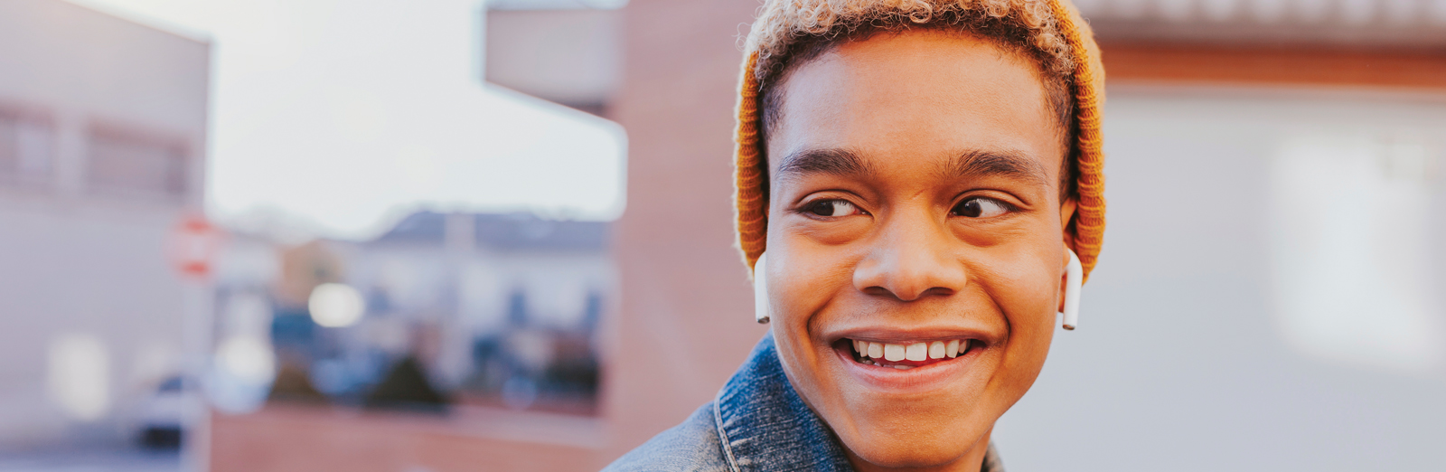 young-man-smiling-1600x522.jpg