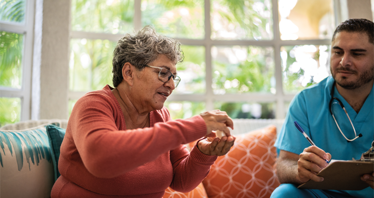 woman-talking-to-doctor-at-home-752x400.png