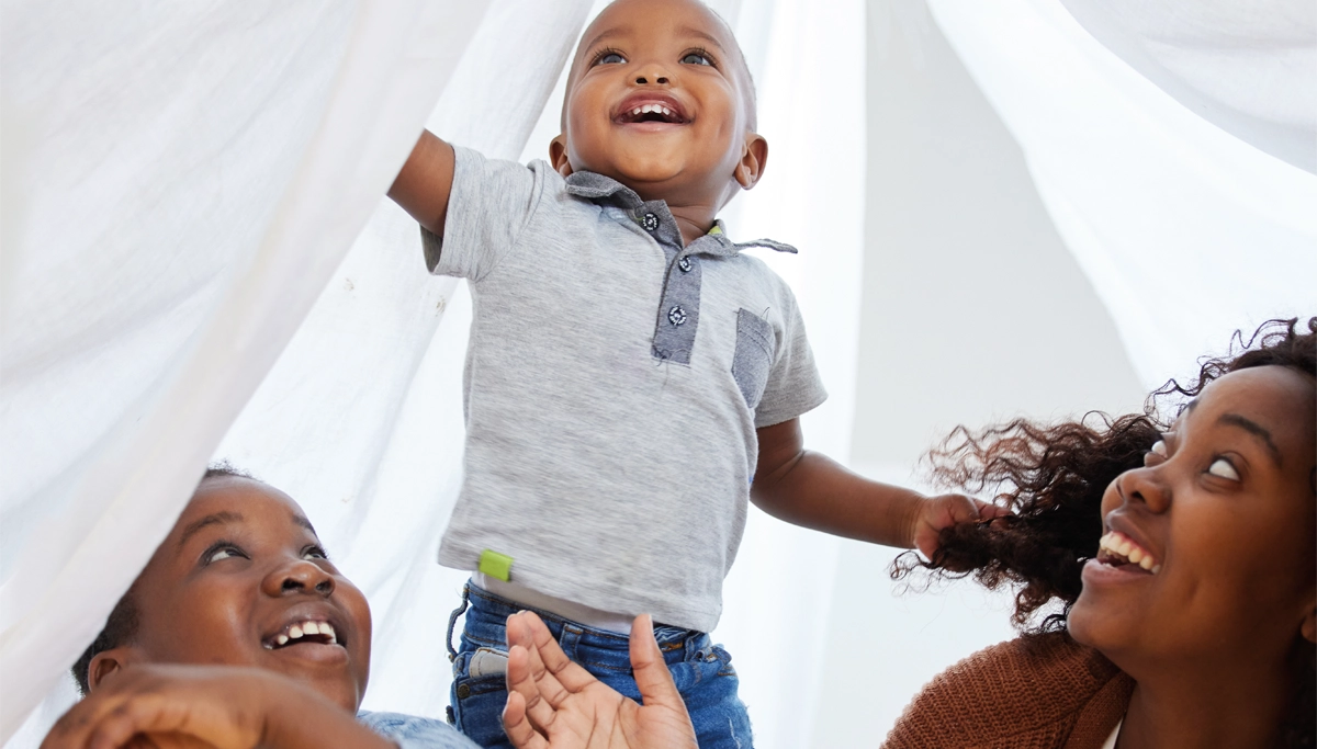 family-in-blanket-fort-1200x683.webp