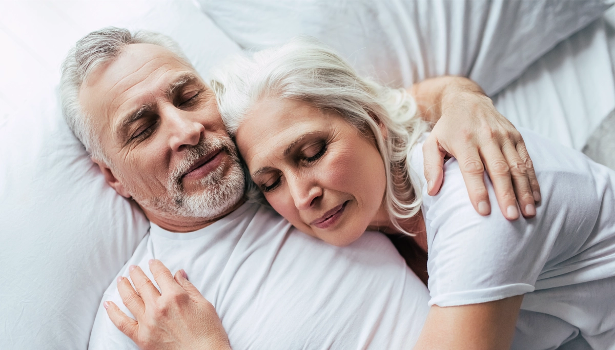 older-couple-sleeping-1200x683.webp