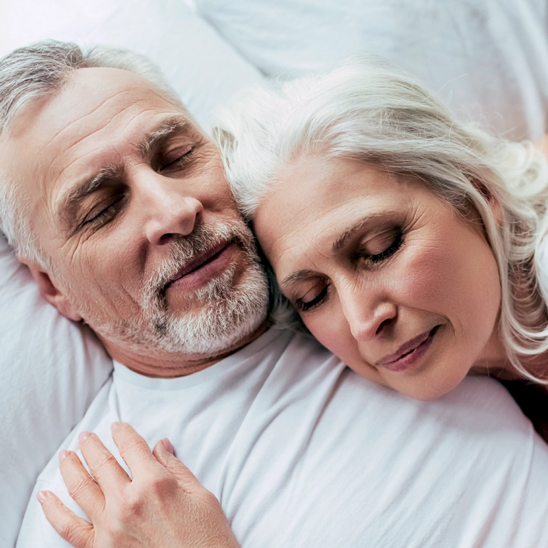 older-couple-sleeping-800x800.webp