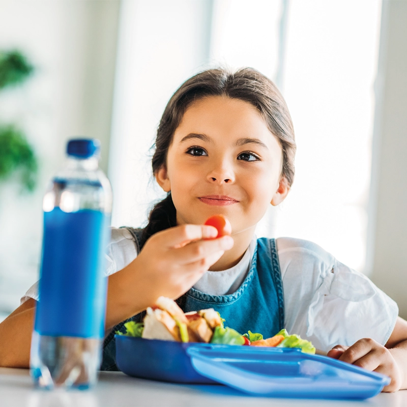 girl-eating-from-lunch-box-800x800.webp